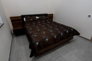 Postel nebo postele na pokoji v ubytování Apartament Grabowski Stone Design