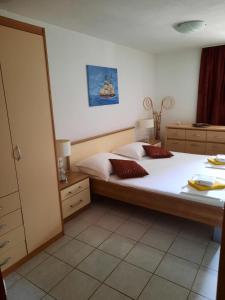 Postel nebo postele na pokoji v ubytování Apartments Sole