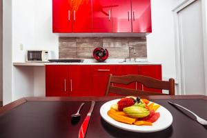 Kuchyň nebo kuchyňský kout v ubytování Fabiola Condo Hotel