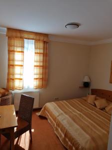 Posteľ alebo postele v izbe v ubytovaní Daniella Apartmens
