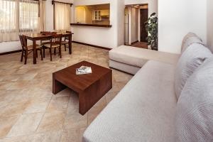 Posezení v ubytování Fabiola Condo Hotel