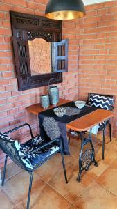 Posezení v ubytování Studio Colonial