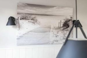 ein Bild einer Promenade zum Strand in der Unterkunft Rothen Huus in Norderney + 12 Fotos