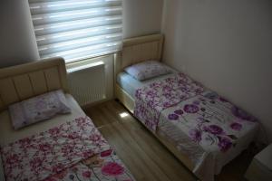 Postel nebo postele na pokoji v ubytování Altay Villa