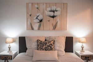 Postel nebo postele na pokoji v ubytování B&B De Klaproos