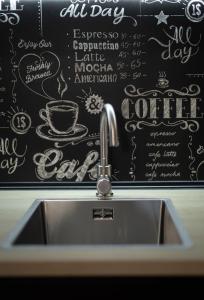 Ein Badezimmer in der Unterkunft Coffee Apartments, MyWeek
