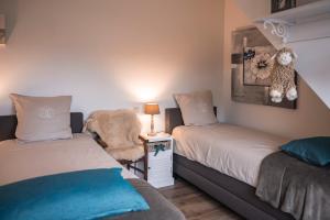 Postel nebo postele na pokoji v ubytování B&B De Klaproos