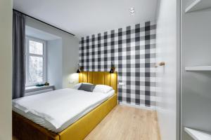 Ein Bett oder Betten in einem Zimmer der Unterkunft Coffee Apartments, MyWeek