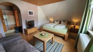 Postel nebo postele na pokoji v ubytování Hotel Pension Wolf