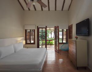 Giường trong phòng chung tại Villa Marina Lodge & Condos