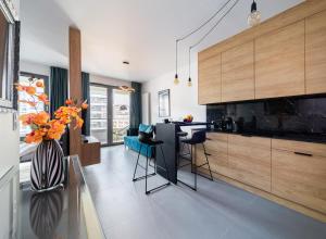Kuchyňa alebo kuchynka v ubytovaní Portowa Przystań by Comfort Apartments