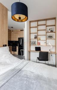 Kuchyňa alebo kuchynka v ubytovaní Portowa Przystań by Comfort Apartments