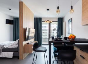 Posteľ alebo postele v izbe v ubytovaní Portowa Przystań by Comfort Apartments