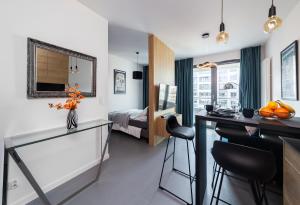 Posedenie v ubytovaní Portowa Przystań by Comfort Apartments