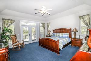 a bedroom with a bed and a ceiling fan at 18814 - 14 Juego Way in Hot Springs Village