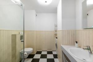 Kúpeľňa v ubytovaní Waw Apartamenty Manhattan