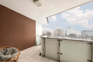 Balkón alebo terasa v ubytovaní Waw Apartamenty Manhattan