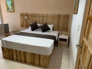 Hotel Bahia Rada客房内的一张或多张床位