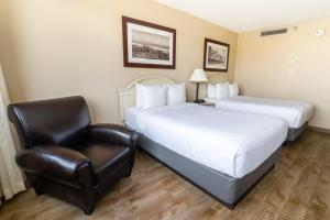 Postel nebo postele na pokoji v ubytování Emerald Beach Hotel Corpus Christi