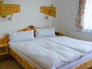 Postel nebo postele na pokoji v ubytování Haus Moser