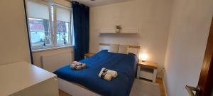 Postel nebo postele na pokoji v ubytování Apartament Piastowska