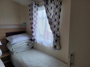 Ένα ή περισσότερα κρεβάτια σε δωμάτιο στο 10 Berth on Seaview (Linwood)