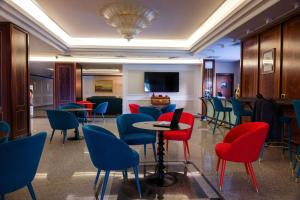 A television and/or entertainment centre at Best Western Hotel Ferrari