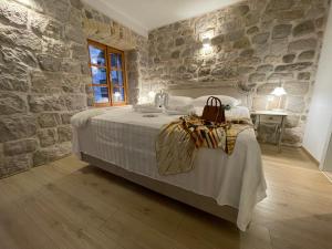 Posteľ alebo postele v izbe v ubytovaní Dubrovnik Throne Suite III.