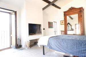 Ein Bett oder Betten in einem Zimmer der Unterkunft Casa Casperia
