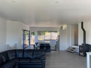 Et opholdsområde på Private Escape Central Wanaka 3 Bedroom