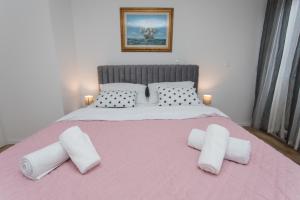 Postel nebo postele na pokoji v ubytování Luxury Apartment Jana