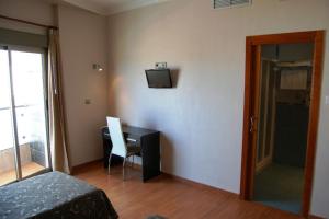 Postel nebo postele na pokoji v ubytování Hotel Almoradi