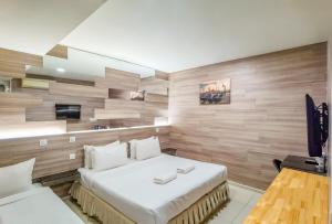 Кровать или кровати в номере Hotel Villa