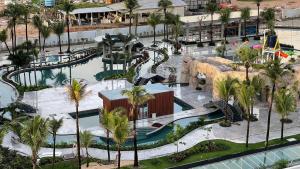 an overhead view of a swimming pool at a resort at Salinas Premiun Resort 703 in Salinópolis