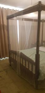 Postel nebo postele na pokoji v ubytování Eve Homestay