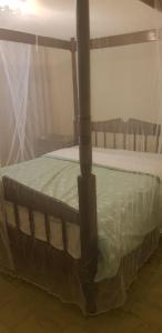 Postel nebo postele na pokoji v ubytování Eve Homestay
