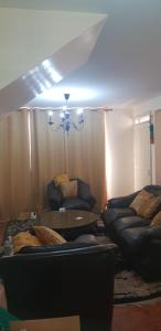 Posezení v ubytování Eve Homestay