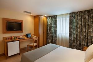 Windsor Martinique Copacabana客房内的一张或多张床位