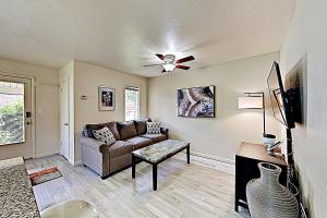 a living room with a couch and a ceiling fan at Homestake Haven 366 in Park City