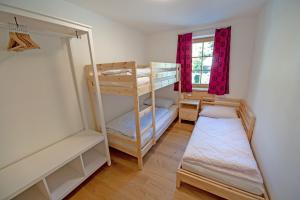 Posteľ alebo postele v izbe v ubytovaní Apartments Alpen Domus