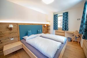 Posteľ alebo postele v izbe v ubytovaní Apartments Alpen Domus