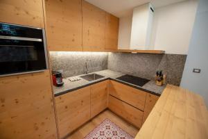 Kuchyňa alebo kuchynka v ubytovaní Apartments Alpen Domus