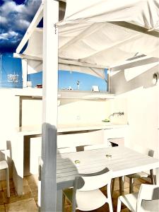 Reštaurácia alebo iné gastronomické zariadenie v ubytovaní Casa con Vista a POLIGNANO a Mare