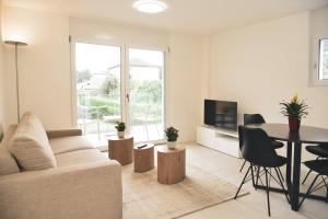 A seating area at Brand New Apartmentcecilia Residence Apt N1