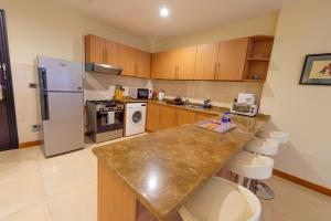 Kuchyň nebo kuchyňský kout v ubytování Luxury Escapes - Stylish 1BR - Murad Tower - Close to the Emirates Mall