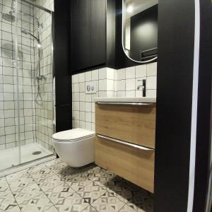 Kylpyhuone majoituspaikassa Apartamenty Białystok - Apartment Royal VI