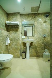 Koupelna v ubytování Welkin Hotel
