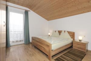 Llit o llits en una habitació de Traterhof-Spinges