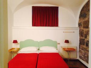 Postel nebo postele na pokoji v ubytování B&B Entro Le Mura