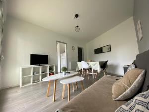 TV a/nebo společenská místnost v ubytování Labenne Ocean - joli appt avec terrasse -T2 300m plage